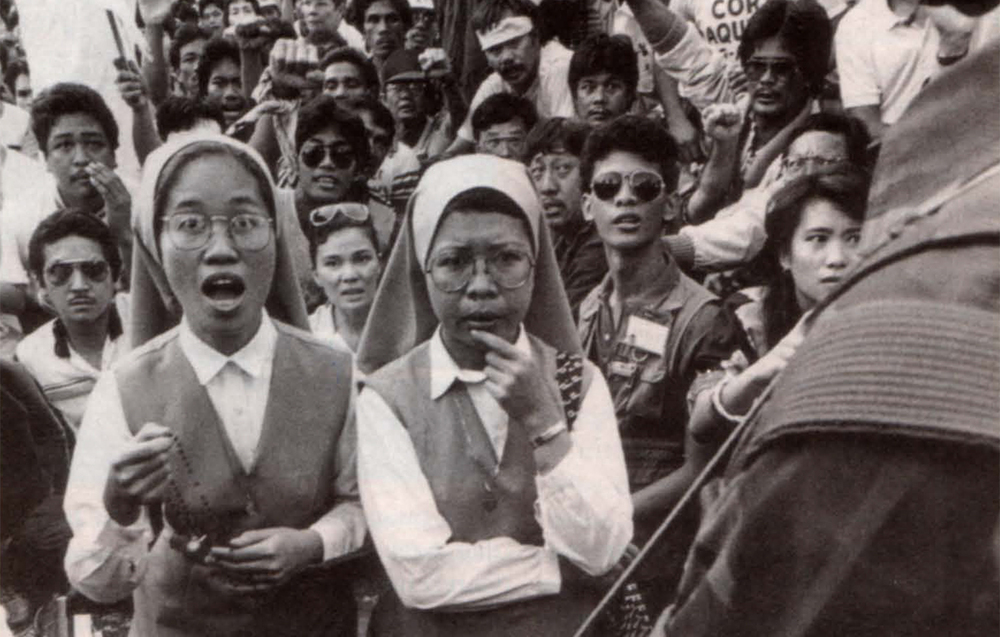 people power revolution on EDSA with nuns praying Rosary